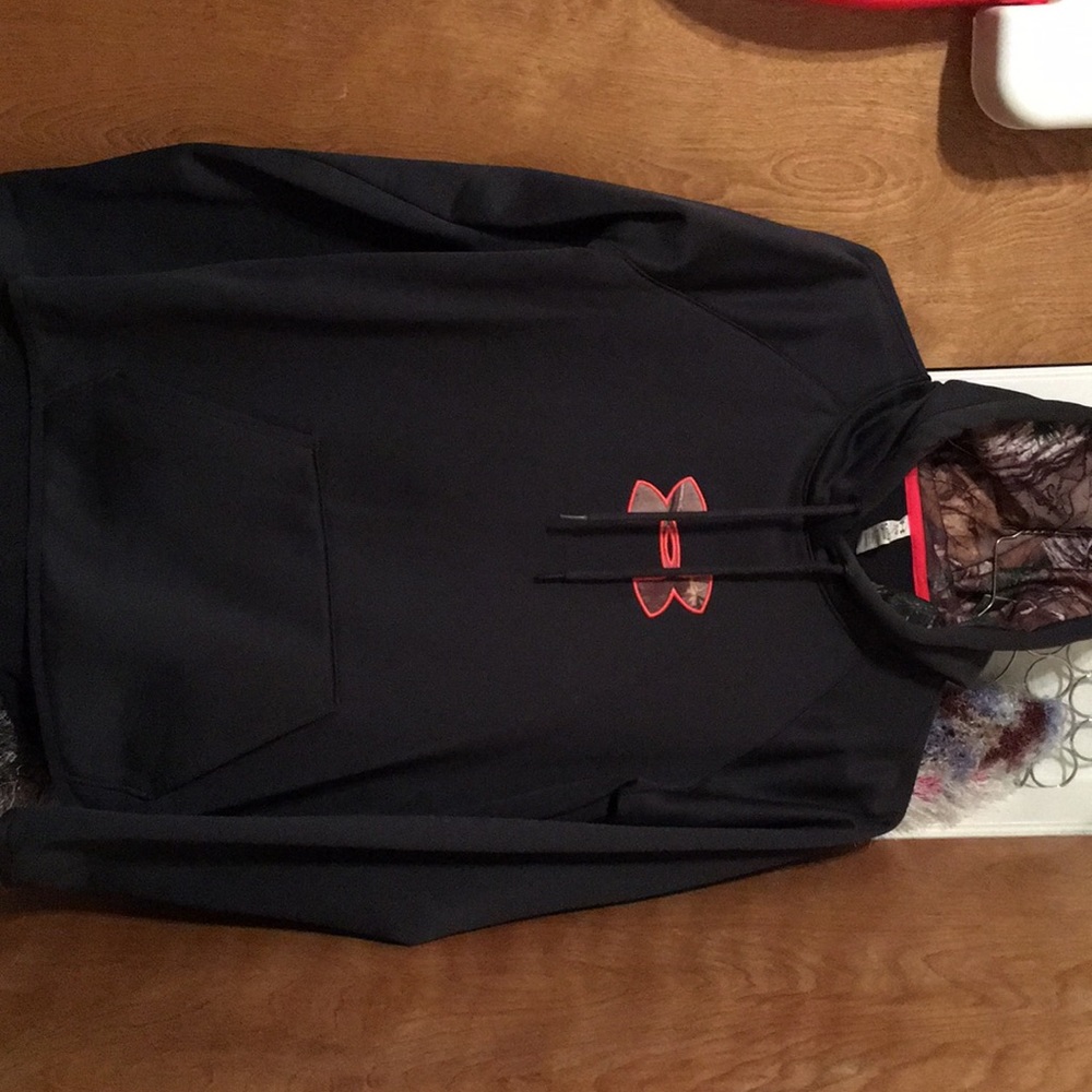 Under armor  sweatshirt with camo inside the hood.